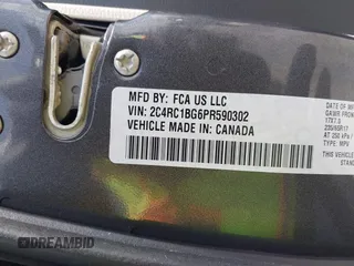 2023 Chrysler Pacifica Touring L with VIN 2C4RC1BG6PR590302, listed as a IAAI auction lot 42451369 with 72,097 mi miles and . Bid and sale history available at DreamBid. Image 9.