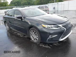 2016 Lexus ES 300h with VIN JTHBW1GG1G2104171, listed as a IAAI auction lot 42546450 with 106,531 mi miles and . Bid and sale history available at DreamBid. Image 1.