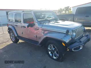 2021 Jeep Wrangler Unlimited Sahara z VIN 1C4HJXEG8MW576811, wystawiony jako IAAI lot #41190001 z przebiegiem 80 997 mil mil oraz . Historia ofert i sprzedaży dostępna na DreamBid. Obrazek 1.