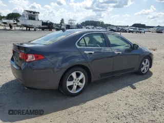 2012 Acura TSX с VIN JH4CU2F41CC009895, выставлен на аукционе Copart как лот 62057995 с пробегом 143 831 миль миль и Списание • Salvage title. История ставок и продаж доступна на DreamBid. Изображение 3.