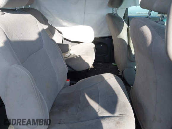 2015 Toyota Sienna L with VIN 5TDZK3DCXFS596277, listed as a IAAI auction lot 41229427 with 108,900 mi miles and . Bid and sale history available at DreamBid. Image 8.