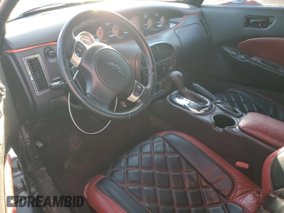 1999 Plymouth Prowler с VIN 1P3EW65G2XV502552, выставлен на аукционе Copart как лот 88120945 с пробегом 63 566 миль миль и Чистый • Clean title. История ставок и продаж доступна на DreamBid. Изображение 8.