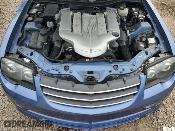 2005 Chrysler Crossfire z VIN 1C3AN79N65X044701, wystawiony jako Copart lot #72050804 z przebiegiem 44 783 mil mil oraz Szkody całkowita. Historia ofert i sprzedaży dostępna na DreamBid. Obrazek 11.