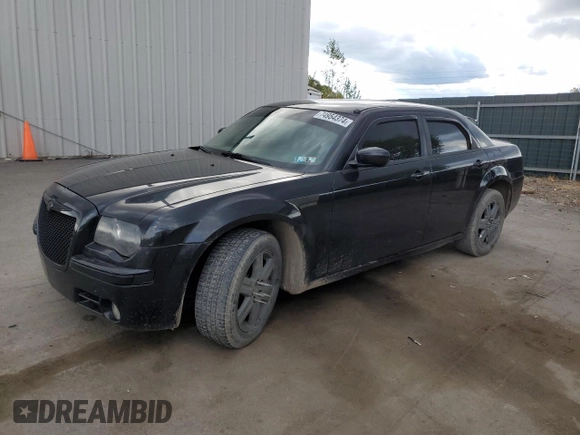 2006 Chrysler 300 C with VIN 2C3LK63H56H142364, listed as a Copart auction lot 74954374 with 124,550 mi miles and Salvage Title. Bid and sale history available at carsss.com. Image 1.