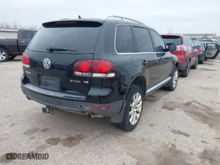 2008 Volkswagen Touareg 2 V6 with VIN WVGBE77L48D005043, listed as a IAAI auction lot 41604378 with 153,541 mi miles. Bid and sale history available at carsss.com. Image 4.