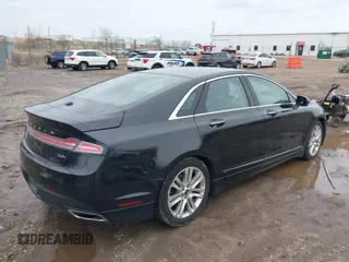 2015 Lincoln MKZ Hybrid with VIN 3LN6L2LUXFR602601, listed as a IAAI auction lot 41956495 with 346,448 mi miles. Bid and sale history available at carsss.com. Image 4.