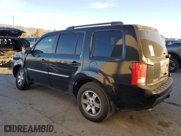 2010 Honda Pilot Touring with VIN 5FNYF3H83AB020730, listed as a Copart auction lot 84697994 with 238,329 mi miles and Salvage Title. Bid and sale history available at DreamBid. Image 2.