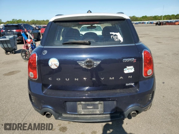 2013 MINI Countryman S with VIN WMWZC3C56DWP23892, listed as a Copart auction lot 58837985 with 98,988 mi miles and Clean title. Bid and sale history available at DreamBid. Image 6.