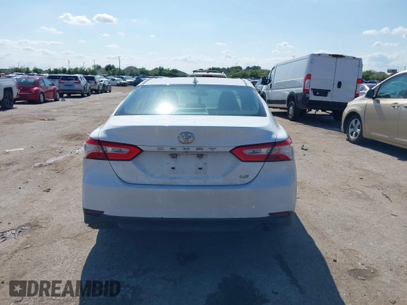 2019 Toyota Camry LE with VIN 4T1B11HK4KU180995, listed as a IAAI auction lot 42088737 with 133,813 mi miles and . Bid and sale history available at DreamBid. Image 17.