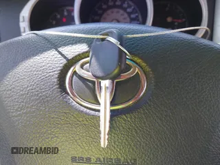 2004 Toyota 4Runner SR5 with VIN JTEBU14R640037597, listed as a IAAI auction lot 41989478 with 281,611 mi miles and . Bid and sale history available at DreamBid. Image 11.