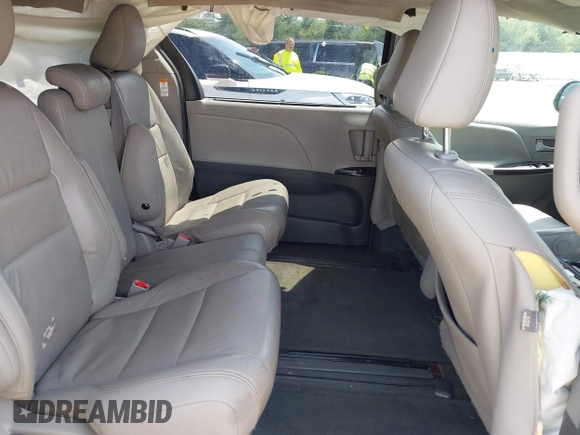 2015 Toyota Sienna XLE with VIN 5TDYK3DCXFS633128, listed as a IAAI auction lot 42527073 with 149,926 mi miles and . Bid and sale history available at DreamBid. Image 8.