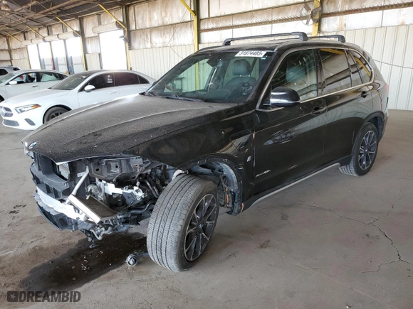 2018 BMW X5 xDrive40e iPerformance with VIN 5UXKT0C53J0W02429, listed as a Copart auction lot 51874485 with 57,480 mi miles and Salvage Title. Bid and sale history available at carsss.com. Image 1.