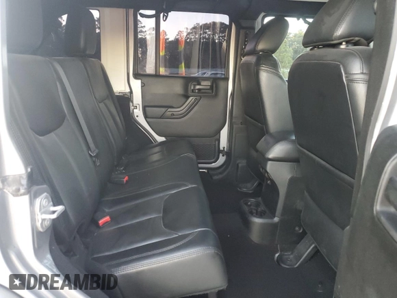 2017 Jeep Wrangler Unlimited Sahara with VIN 1C4HJWEG8HL697341, listed as a Copart auction lot 81313424 with 118,693 mi miles and Salvage title. Bid and sale history available at DreamBid. Image 10.