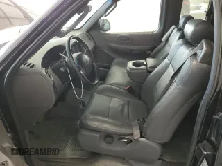 2002 Ford F-150 XL with VIN 2FTRX07W72CA71544, listed as a Copart auction lot 81628694 with 313,663 mi miles and Salvage title. Bid and sale history available at DreamBid. Image 7.