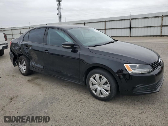 2014 Volkswagen Jetta SE with VIN 3VWD17AJ2EM381057, listed as a Copart auction lot 54267475 with 187,770 mi miles and Salvage title. Bid and sale history available at DreamBid. Image 4.