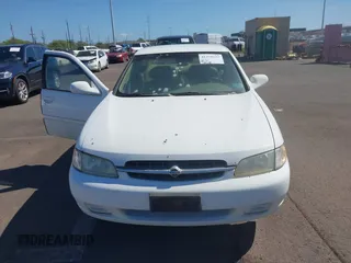 1999 Nissan Altima XE with VIN 1N4DL01D2XC125672, listed as a IAAI auction lot 41379153 with 183,685 mi miles. Bid and sale history available at carsss.com. Image 6.