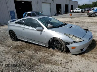 2003 Toyota Celica GT z VIN JTDDR32T730157268, wystawiony jako Copart lot #68884804 z przebiegiem 209 728 mil mil oraz Nie do naprawy • Non repairable. Historia ofert i sprzedaży dostępna na DreamBid. Obrazek 4.
