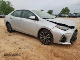 2019 Toyota Corolla L with VIN 5YFBURHE5KP910088, listed as a Copart auction lot 52401885 with 130,124 mi miles and Salvage Title. Bid and sale history available at DreamBid. Image 4.
