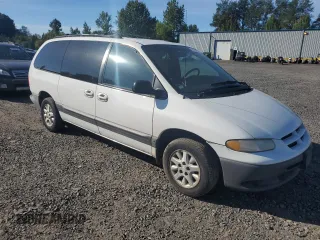 2000 Dodge Caravan SE with VIN 1B4GP44L3YB734876, listed as a Copart auction lot 72469374 with 215,240 mi miles and Salvage Title. Bid and sale history available at carsss.com. Image 4.