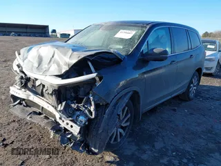 2020 Honda Pilot EX-L with VIN 5FNYF5H58LB016094, listed as a IAAI auction lot 41396607 with 117,317 mi miles. Bid and sale history available at carsss.com. Image 2.