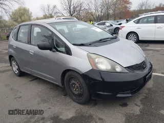 2009 Honda Fit with VIN JHMGE882X9S015593, listed as a IAAI auction lot 41979937 with 204,928 mi miles. Bid and sale history available at carsss.com. Image 1.