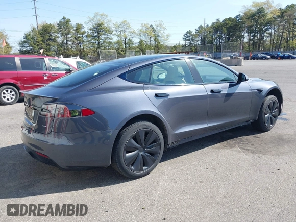 2021 Tesla Model S Plaid with VIN 5YJSA1E66MF456357, listed as a IAAI auction lot 42130286 with 48,010 mi miles. Bid and sale history available at carsss.com. Image 4.
