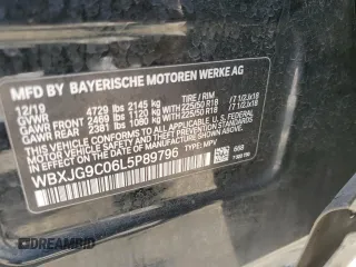 2020 BMW X1 xDrive28i with VIN WBXJG9C06L5P89796, listed as a Copart auction lot 52817235 with 95,665 mi miles and Salvage title. Bid and sale history available at DreamBid. Image 16.