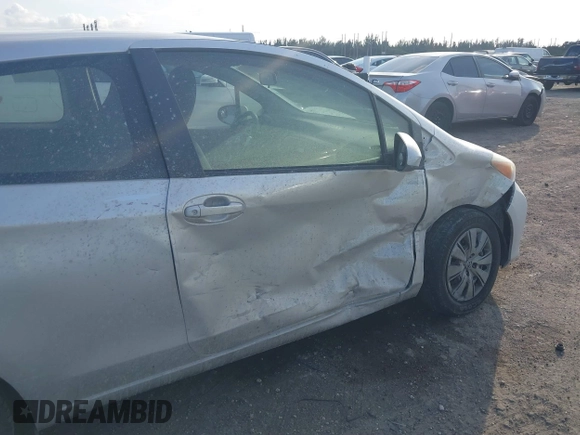 2014 Toyota Yaris L with VIN JTDJTUD33ED592307, listed as a IAAI auction lot 41418409 with 91,209 mi miles and . Bid and sale history available at DreamBid. Image 13.