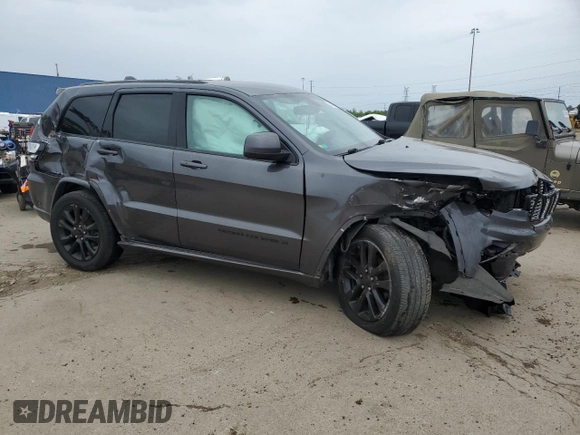 2018 Jeep Grand Cherokee Laredo with VIN 1C4RJFAG2JC179354, listed as a Copart auction lot 57806255 with 128,968 mi miles and Clean title. Bid and sale history available at DreamBid. Image 4.