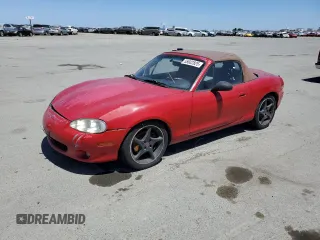 2003 Mazda MX-5 Miata Cloth z VIN JM1NB353830311703, wystawiony jako Copart lot #55602825 z przebiegiem 309 689 mil mil oraz Czysty tytuł • Clean title. Historia ofert i sprzedaży dostępna na DreamBid. Obrazek 1.