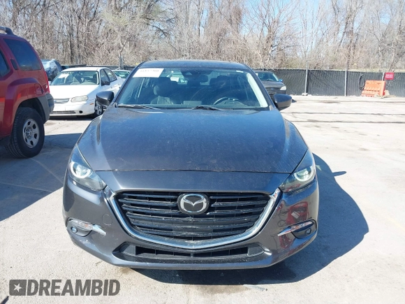 2017 Mazda 3 Grand Touring z VIN 3MZBN1W39HM137879, wystawiony jako IAAI lot #41857308 z przebiegiem 73 569 mil mil oraz . Historia ofert i sprzedaży dostępna na DreamBid. Obrazek 6.