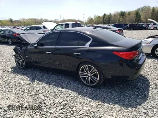 2015 Infiniti Q50 Premium z VIN JN1BV7AR2FM395318, wystawiony jako Copart lot #55029355 z przebiegiem 186 303 mil mil oraz Czysty tytuł • Clean title. Historia ofert i sprzedaży dostępna na DreamBid. Obrazek 2.