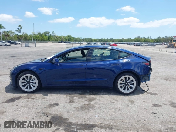 2023 Tesla Model 3 with VIN 5YJ3E1EA0PF658080, listed as a IAAI auction lot 42008846 with 32,301 mi miles and . Bid and sale history available at carsss.com. Image 15.