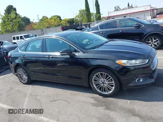 2015 Ford Fusion SE with VIN 3FA6P0HDXFR195603, listed as a IAAI auction lot 42761373 with 105,719 mi miles and . Bid and sale history available at DreamBid. Image 13.