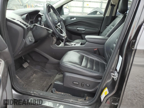 2018 Ford Escape Titanium with VIN 1FMCU9J97JUB34691, listed as a Copart auction lot 56404625 with 107,037 mi miles and Salvage title. Bid and sale history available at DreamBid. Image 7.