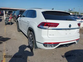 2022 Volkswagen Atlas SEL Premium R-Line with VIN 1V2FE2CA6NC220596, listed as a IAAI auction lot 41864407 with 13,120 mi miles and . Bid and sale history available at DreamBid. Image 3.