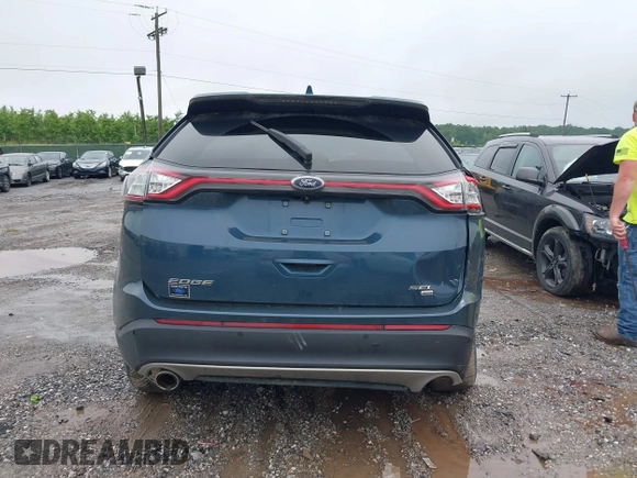 2016 Ford Edge SEL z VIN 2FMPK4J8XGBC48801, wystawiony jako IAAI lot #42274392 z przebiegiem 76 131 mil mil oraz . Historia ofert i sprzedaży dostępna na DreamBid. Obrazek 16.