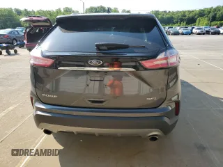 2020 Ford Edge SEL с VIN 2FMPK3J97LBB58552, выставлен на аукционе Copart как лот 58472995 с пробегом 71 387 миль миль и Списание • Salvage title. История ставок и продаж доступна на DreamBid. Изображение 6.