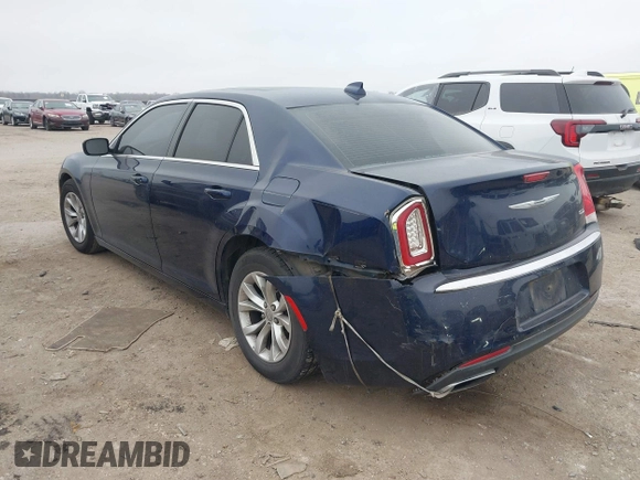 2015 Chrysler 300 Limited with VIN 2C3CCAAG5FH796498, listed as a IAAI auction lot 41520694 with 165,433 mi miles. Bid and sale history available at carsss.com. Image 3.