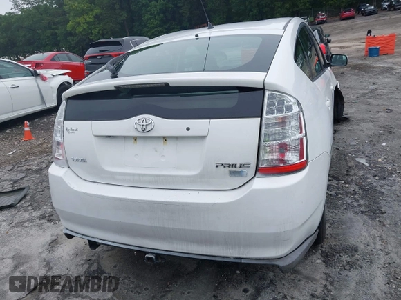 2009 Toyota Prius z VIN JTDKB20U897831736, wystawiony jako IAAI lot #42351310 z przebiegiem 355 571 mil mil oraz . Historia ofert i sprzedaży dostępna na DreamBid. Obrazek 16.