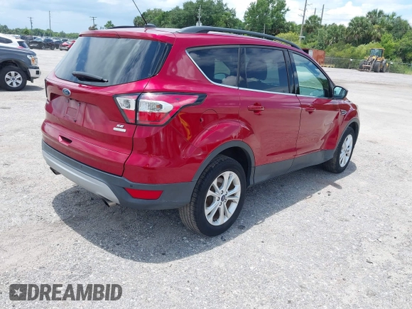 2017 Ford Escape SE z VIN 1FMCU0G95HUE86116, wystawiony jako IAAI lot #42397021 z przebiegiem 115 573 mil mil oraz . Historia ofert i sprzedaży dostępna na DreamBid. Obrazek 4.