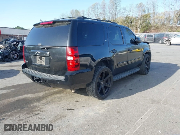 2014 Chevrolet Tahoe LT with VIN 1GNSCBE0XER202150, listed as a IAAI auction lot 41922771 with 168,693 mi miles and . Bid and sale history available at DreamBid. Image 4.