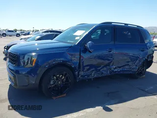 2024 Kia Telluride SX Prestige X-Pro with VIN 5XYP5DGC9RG552885, listed as a IAAI auction lot 42554187 with 10,482 mi miles and . Bid and sale history available at DreamBid. Image 2.