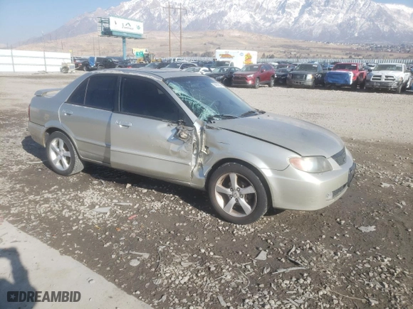 2003 Mazda Protege DX with VIN JM1BJ225431109585, listed as a Copart auction lot 88652505 with 246,348 mi miles and Salvage Title. Bid and sale history available at carsss.com. Image 4.
