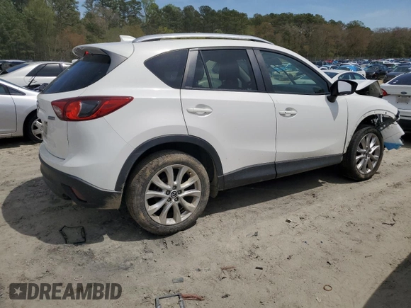 2015 Mazda CX-5 Grand Touring with VIN JM3KE4DY0F0458719, listed as a Copart auction lot 52960365 with 128,372 mi miles and Salvage Title. Bid and sale history available at DreamBid. Image 3.