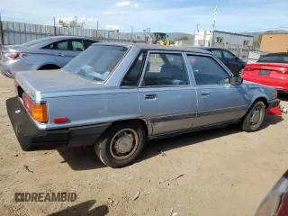 1986 Toyota Camry z VIN JT2SV12E3G6021210, wystawiony jako Copart lot #49623985 z przebiegiem 144 064 mil mil oraz Czysty tytuł • Clean title. Historia ofert i sprzedaży dostępna na DreamBid. Obrazek 3.