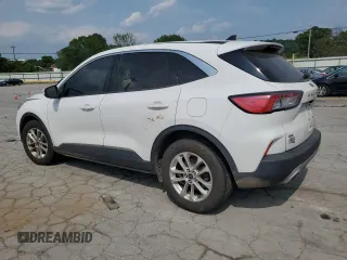 2020 Ford Escape SE with VIN 1FMCU0G68LUC12424, listed as a Copart auction lot 59715325 with 106,570 mi miles and Salvage title. Bid and sale history available at DreamBid. Image 2.