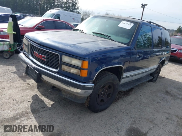 1997 GMC Yukon with VIN 1GKEK13R8VJ737324, listed as a IAAI auction lot 41675479 with 237,223 mi miles. Bid and sale history available at carsss.com. Image 2.