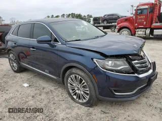 2017 Lincoln MKX Reserve with VIN 2LMPJ8LR6HBL22365, listed as a Copart auction lot 87891455 with 60,871 mi miles and Salvage title. Bid and sale history available at DreamBid. Image 4.