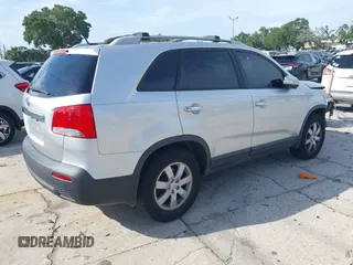 2011 Kia Sorento LX with VIN 5XYKTCA16BG187413, listed as a IAAI auction lot 42538874 with 162,002 mi miles and . Bid and sale history available at DreamBid. Image 4.
